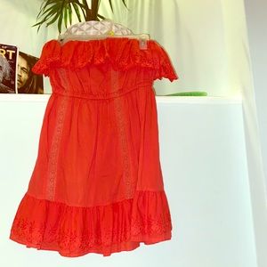 Strapless red mini dress with cinched waist